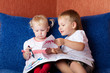 Foto: two children looking painting two children looking painting