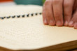 hand reading in braille