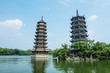 Banyan Lake Pagodas, Guilin, China ,one represents the sun,