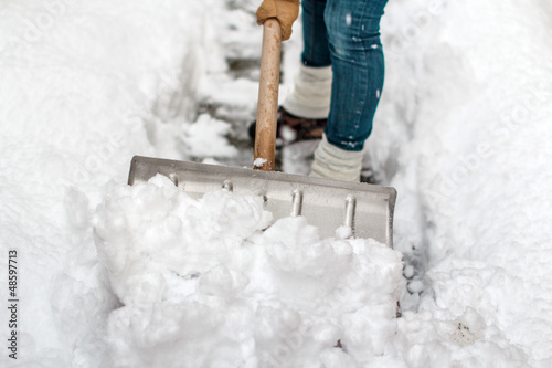Photo: Work with snow showel Work with snow showel