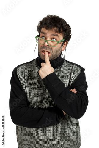 Photo: man puts finger in his mouth to reflect man puts finger in his mouth to reflect
