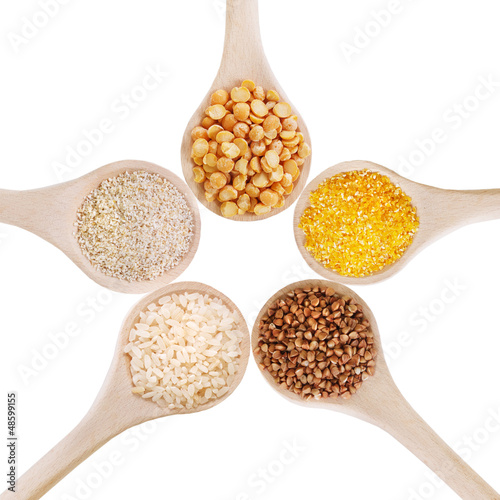 Photo: Wooden spoons on white background Wooden spoons on white background