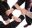 Businesspeople linking hands - teamwork