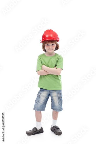 Photo: Proud child with his father hard hat Proud child with his father hard hat