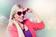 valentine's day young girl with heart shaped glasses