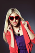valentine's day young girl with heart shaped glasses