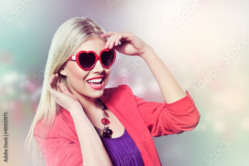 Photo: valentine's day young girl with heart shaped glasses valentine's day young girl with heart shaped glasses