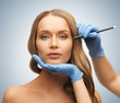 woman face and beautician hands