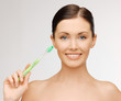 woman with toothbrush