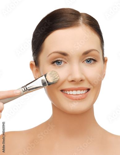 Photo: beautiful woman with brush beautiful woman with brush