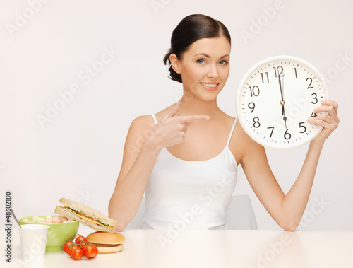 Photo: woman with big clock woman with big clock