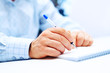 Image of businessman hand writing