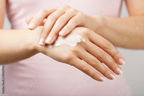 Photo: beautiful woman hands with cream beautiful woman hands with cream