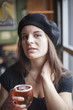 Young Woman Drinking Inda Pale Ale