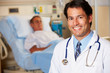 Portrait Of Doctor With Patient In Background