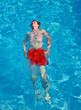 child has fun in the pool