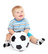 Little boy playing with soccer-ball, isolated on white.