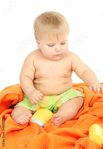 Photo: Little boy with color towel, isolated on white Little boy with color towel, isolated on white