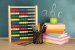 Toy abacus, books and pencils