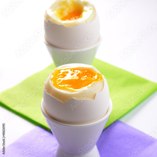 Photo: Breakfast of boiled egg in white cup Breakfast of boiled egg in white cup