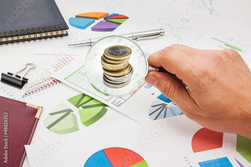 Photo: Graphs tables and documents Graphs tables and documents