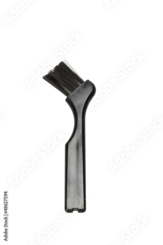 Photo: Close-up of a hair dye brush Close-up of a hair dye brush