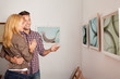 young atractive couple at an art exhibition