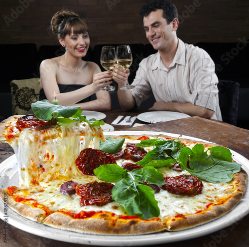 Photo: casal na pizzaria casal na pizzaria