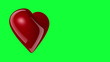 Red heart rotating on the greenscreen background