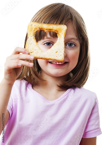 Photo: little girl holding bread - white background little girl holding bread - white background