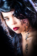 Beautiful brunette Asian woman with long black hair