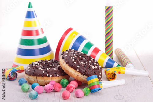 Photo: chocolate donuts with carnival decoration chocolate donuts with carnival decoration