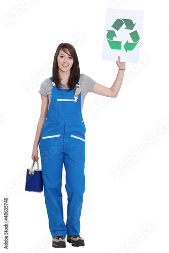 Photo: Painter holding recycling logo Painter holding recycling logo