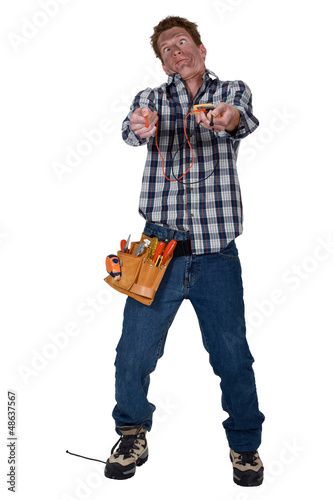 Photo: Man getting an electric shock Man getting an electric shock