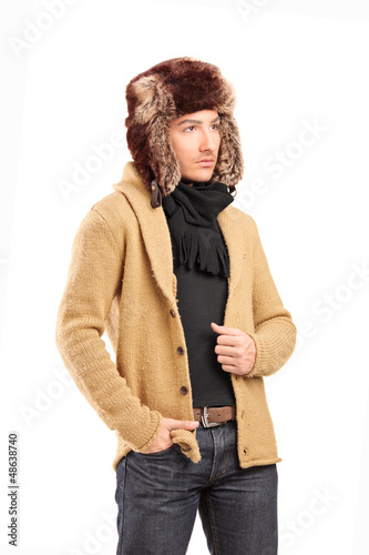 Photo: A smiling man with fur hat posing A smiling man with fur hat posing
