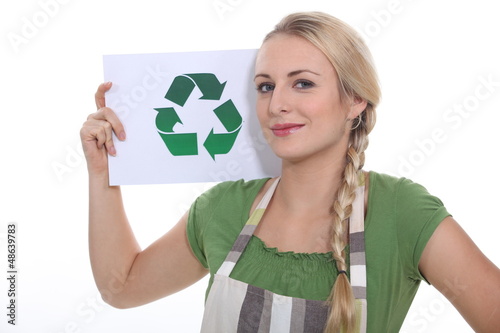 Photo: blonde woman showing the recycling symbol blonde woman showing the recycling symbol