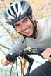 Man riding his bike