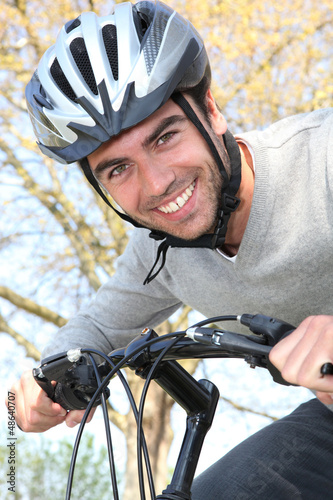 Photo: Man riding his bike Man riding his bike