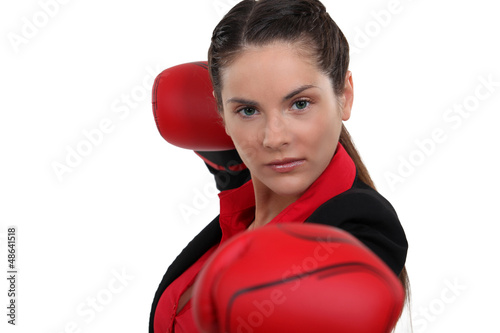 Photo: Woman throwing a punch Woman throwing a punch