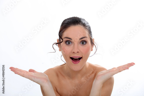 Photo: Amazed woman with bare shoulders Amazed woman with bare shoulders