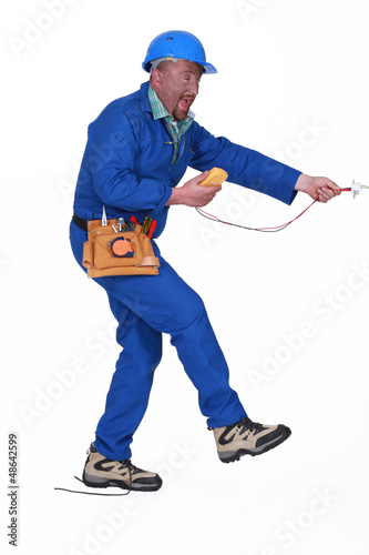 Photo: electrician having an accident electrician having an accident