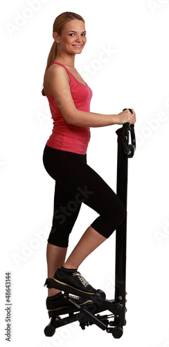 Photo: Blonde Woman Exercising on a Stepper Blonde Woman Exercising on a Stepper