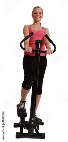 Photo: Blonde Woman Exercising on a Stepper Blonde Woman Exercising on a Stepper