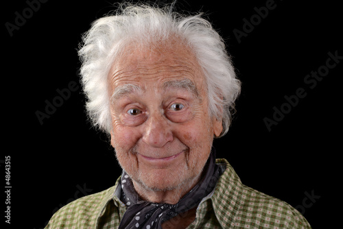Photo: Funny old man with white hair smiling Funny old man with white hair smiling