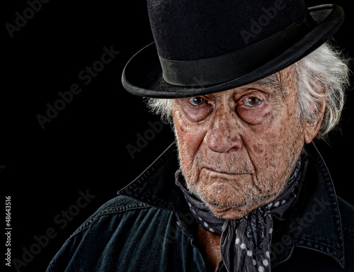 Photo: Old man wearing a bowler hat Old man wearing a bowler hat