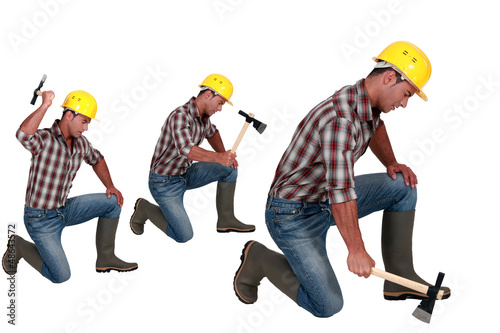 Photo: Construction worker in different poses with an axe Construction worker in different poses with an axe
