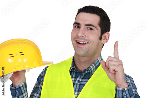 Photo: Construction worker having an idea Construction worker having an idea