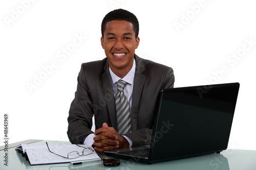 Photo: Portrait of a smiling young businessman Portrait of a smiling young businessman