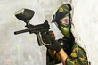 Photo: paintball player under cover paintball player under cover