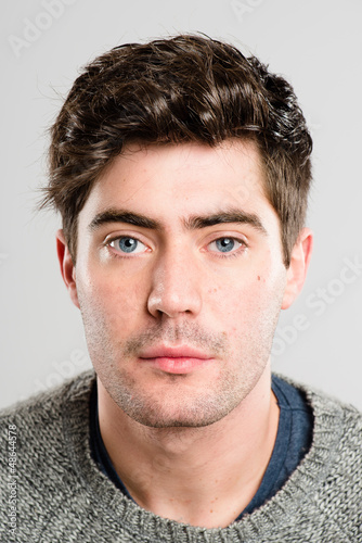 Photo: serious man portrait real people high definition grey background serious man portrait real people high definition grey background